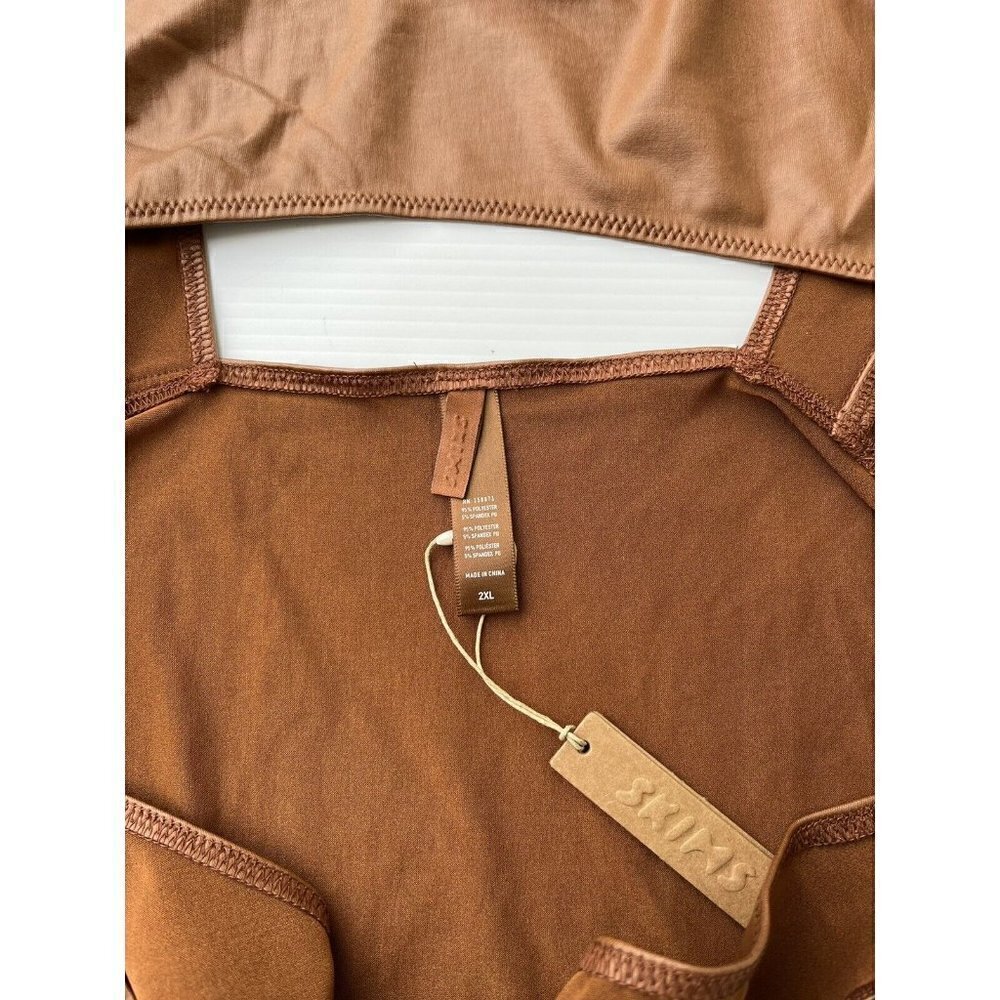 SKIMS Kim Kardashian Wet Jersey Cutout Swimsuit in Copper - Picture 4 of 6